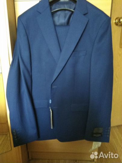 Продам новый костюм
