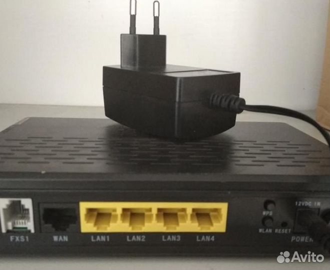 Телефонный VoIP-маршрутизатор D-Link