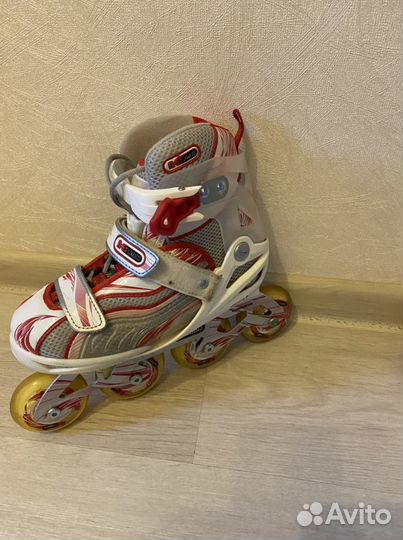 Роликовые коньки