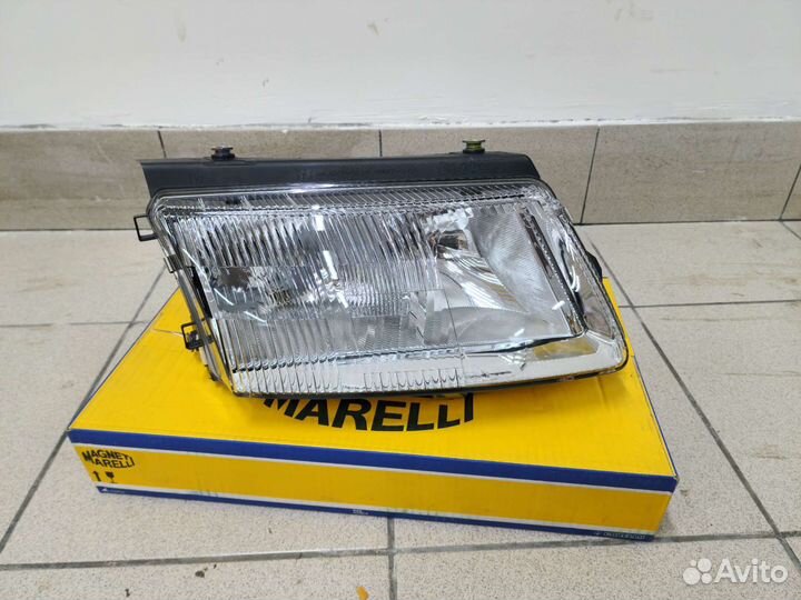 Передняя новая Hella фара VW Passat B5 (Без птф) R