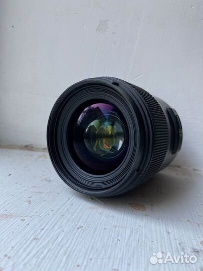 Объектив Sigma 35 mm 1.4 canon