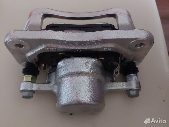 Суппорт задний левый ssangyong rexton - kyron