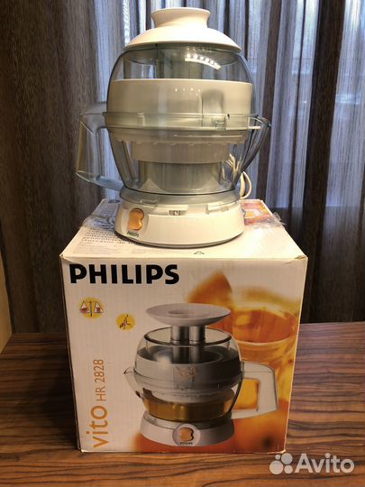 Электрическая соковыжималка philips