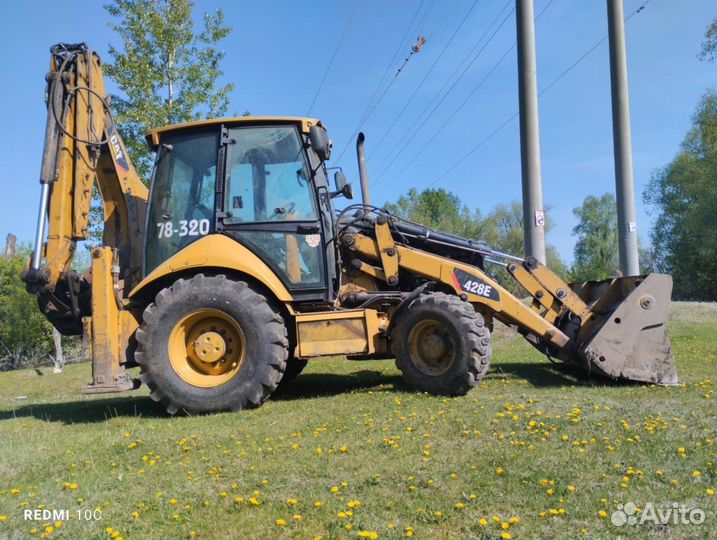 Экскаватор-погрузчик CAT 428E, 2011