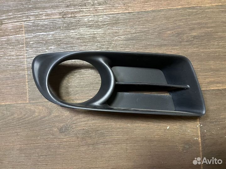 Накладка, облицовка правой птф Toyota Corolla E12