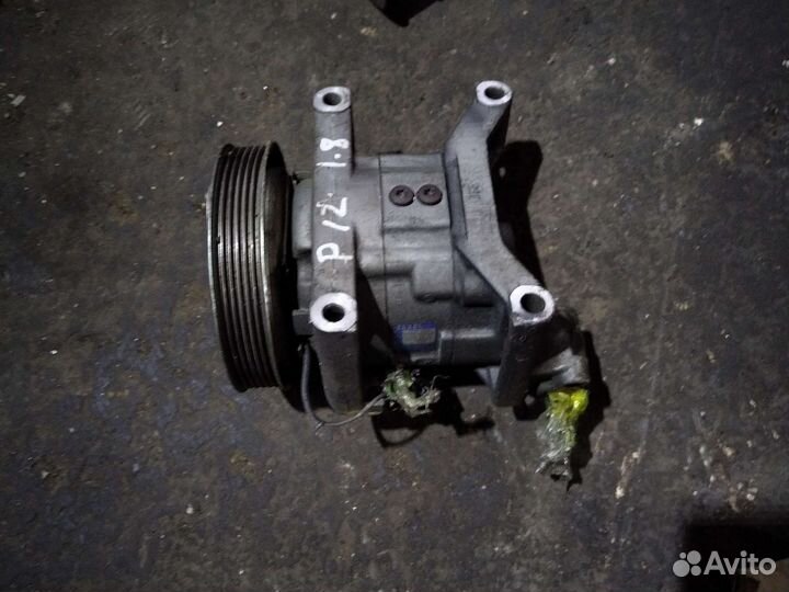 Компрессор кондиционера Ниссан п12