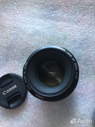 Новый. Canon 50mm 1.4