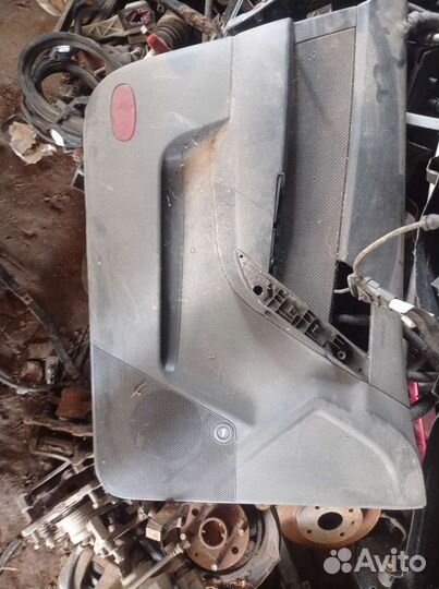Chevrolet aveo т250 обшивка двери левая