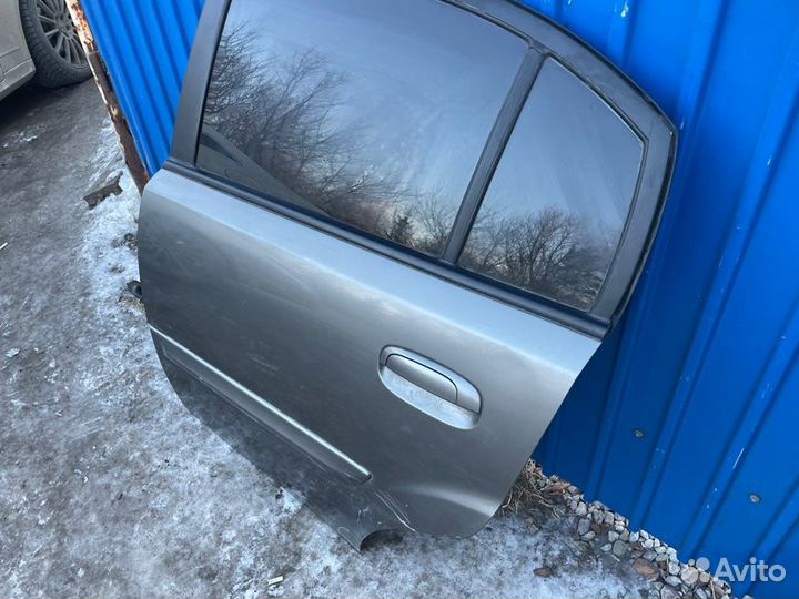 Дверь задняя левая Kia Rio 2010