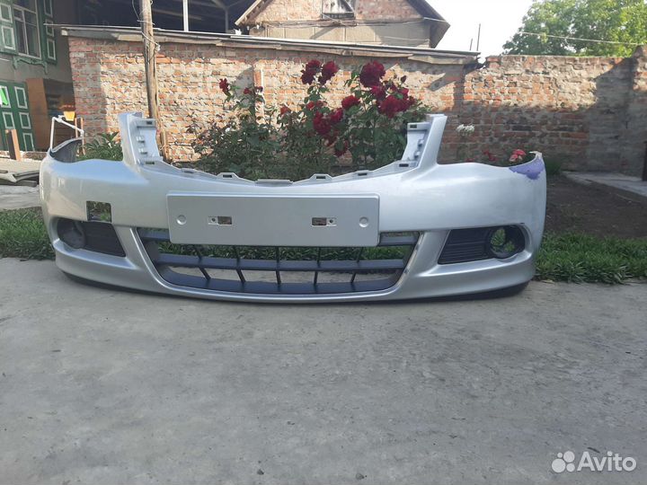 Бампер передний на nissan almera g15