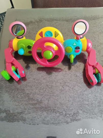 Игрушка руль на коляску