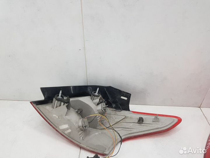 Фонарь задний левый наружный Ford Focus