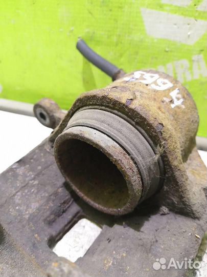 Суппорт передний левый Хендай Элантра 3