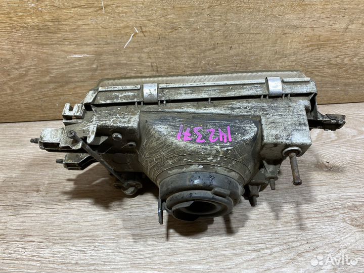 Фара передняя левая Toyota Corona T150 142371