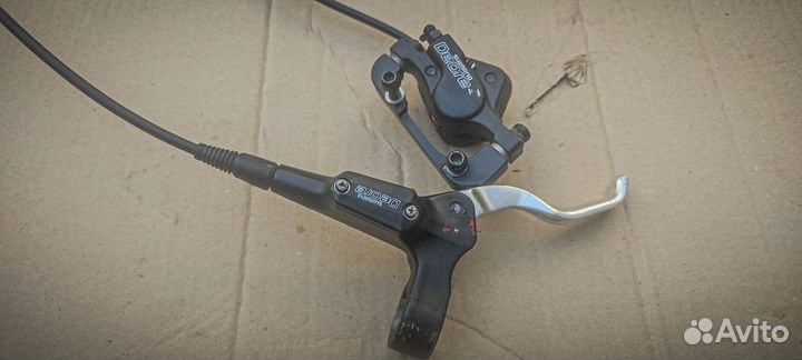 Задний тормоз Shimano Deore