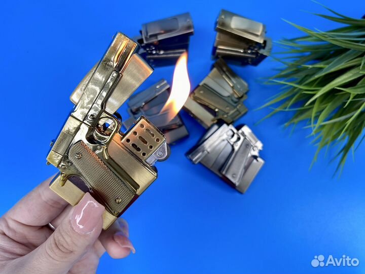 Зажигалка кремневая в виде складного пистолета