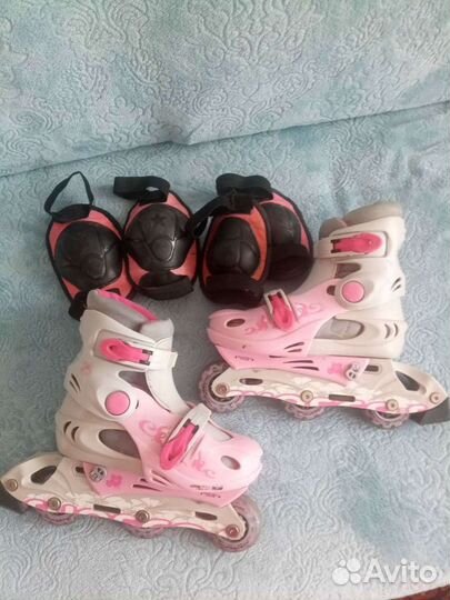 Роликовые коньки