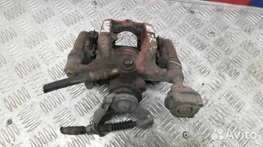 Суппорт тормозной задний правый opel zafira C (KDN