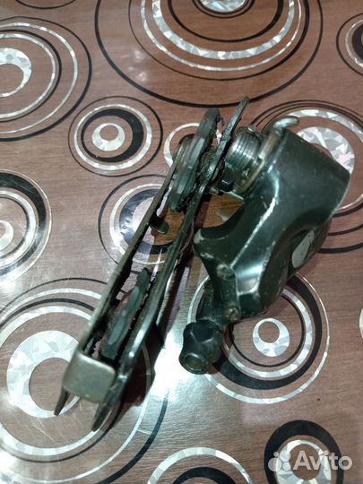 Задний переключатель ск. Шимано Алтус