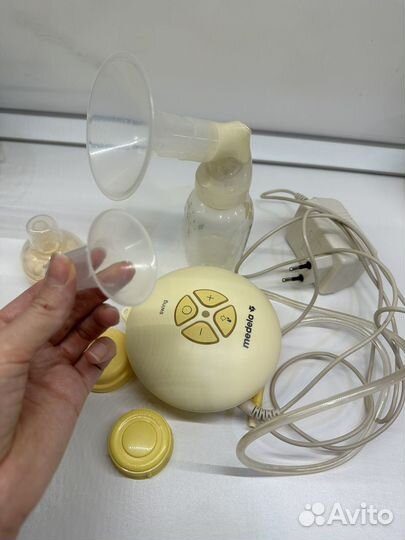 Молокоотсос medela электрический