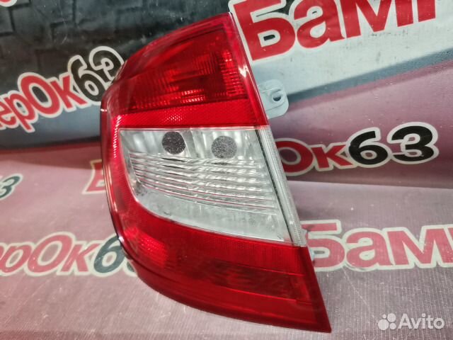 Фонарь задний Skoda Rapid