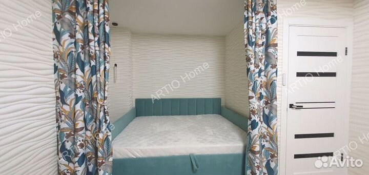 Кровать с подъемным механизмом