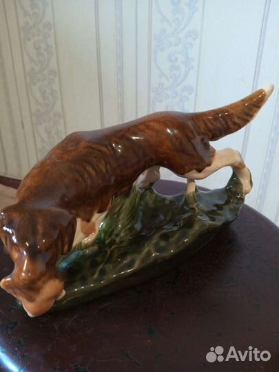 Собака с уткой