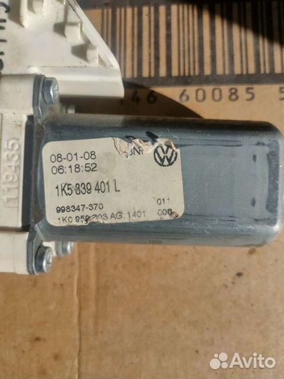 Моторчик стеклоподъемника задний левый Jetta 5