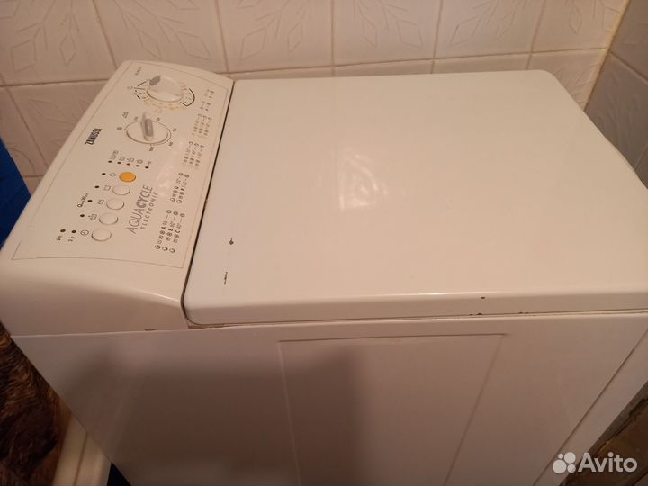 Стиральная машинка с вертикальной загрузкой