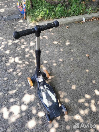 Четырех колесный самокат