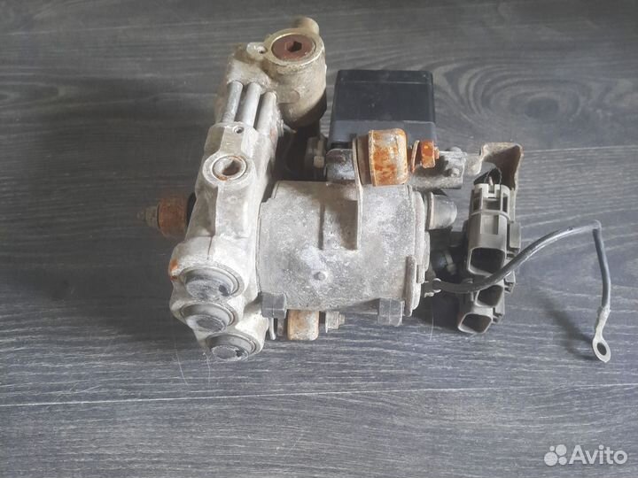 Блок abs Nissan Prairie