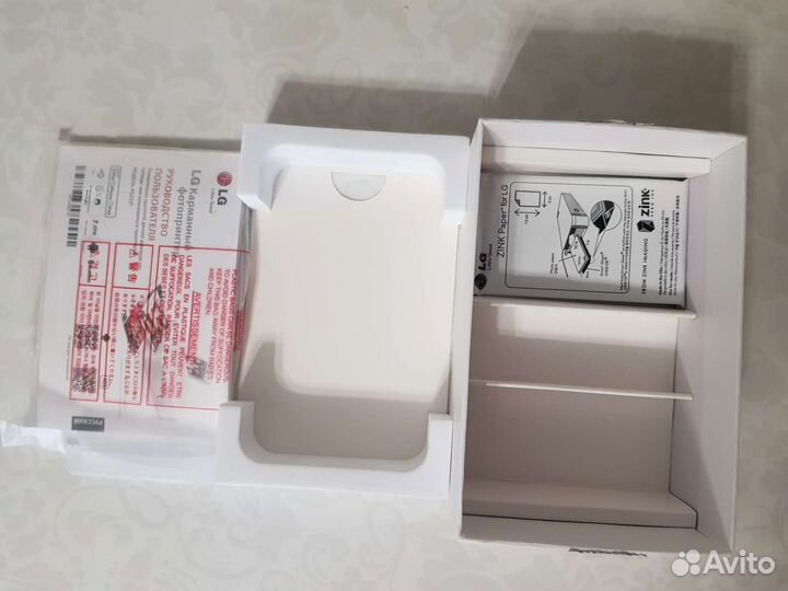 Карманный фотопринтер LG PD233T