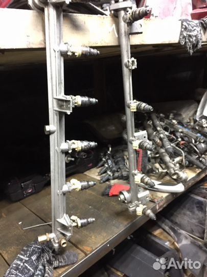 Рейка топливная Mercedes W140 A1040780845