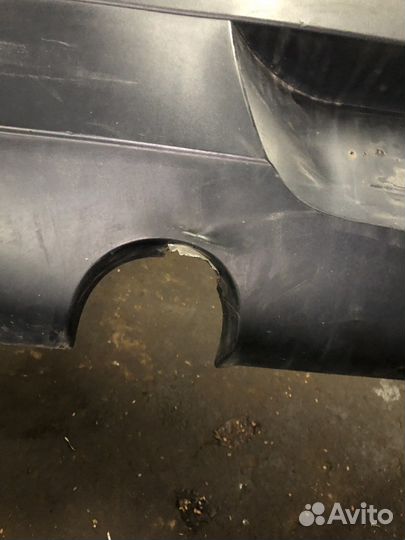 Задний бампер с дефектом на renault logan 1 2008г