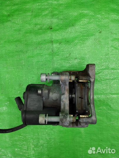 Суппорт зад. лев. с моторчиком VW Tiguan 07-16