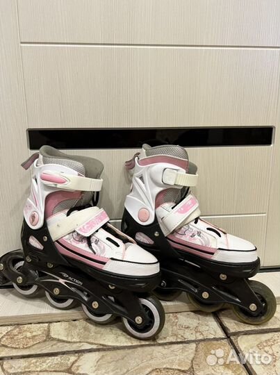 Роликовые коньки