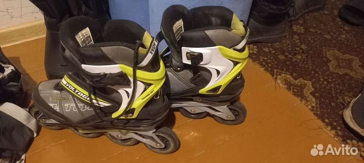 Роликовые коньки