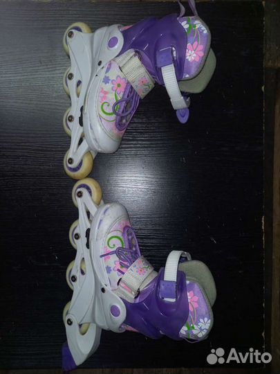 Роликовые коньки