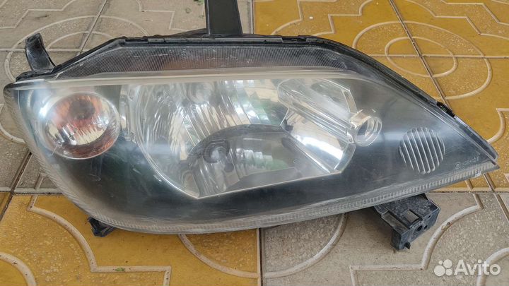 Фара mazda demio dy3w