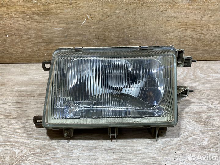 Фара передняя левая Toyota Corona T150 142371