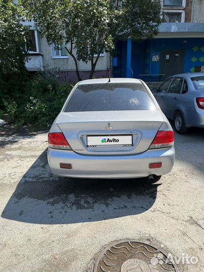 Mitsubishi Lancer 1.6 МТ, 2005, 313 000 км