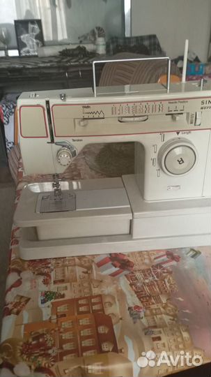 Швейная машинка зингер электрическая
