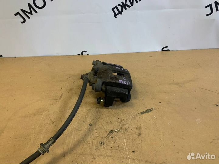 Тормозной суппорт зад. левый Nissan X-Trail