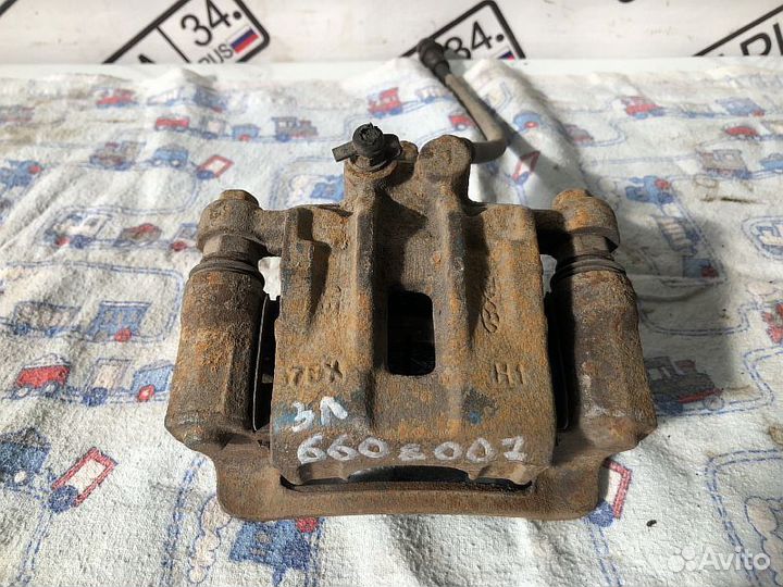 Суппорт тормозной задний левый Kia Ceed 2007