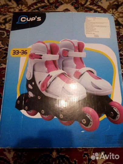 Роликовые коньки