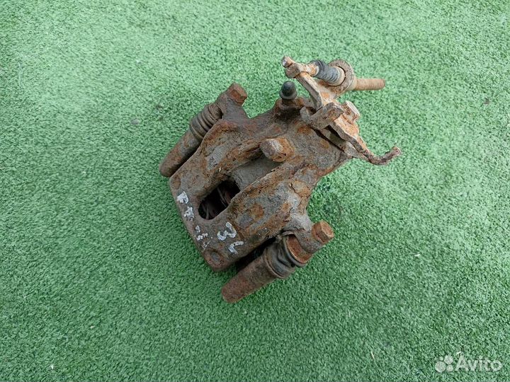 Тормозной суппорт задний левый Ford Focus 1