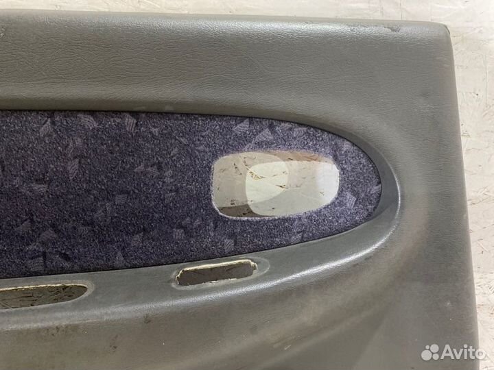 Обшивка боковой двери задняя левая Kia Spectra