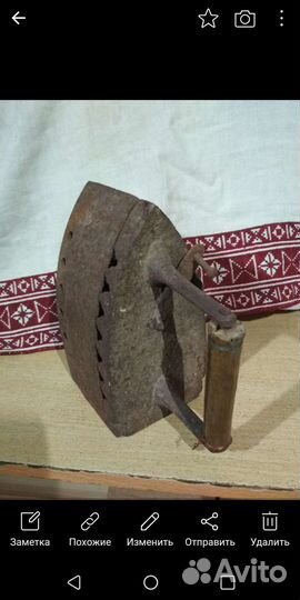 Старинный утюг на углях