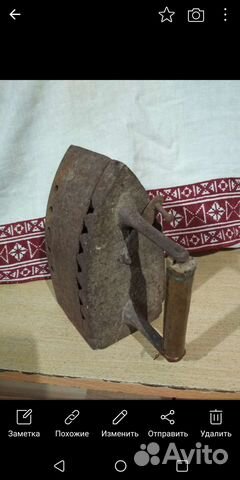Старинный утюг на углях