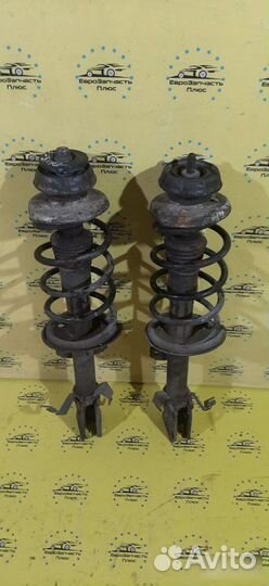 Стойка амортизатора передняя Renault Duster 1